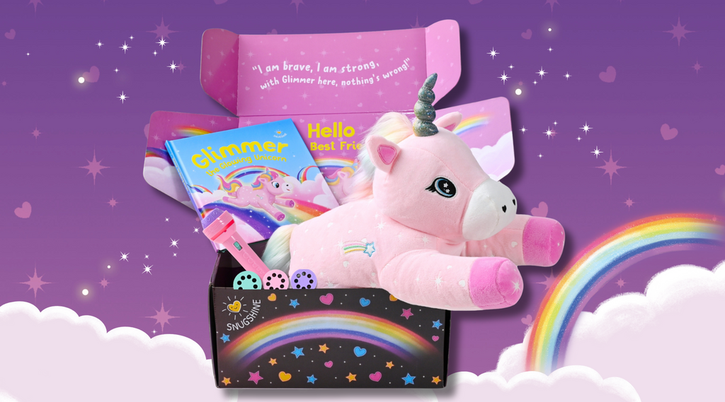 Glimmer the Glowing Unicorn is bursting out of her gift box on a bed of clouds